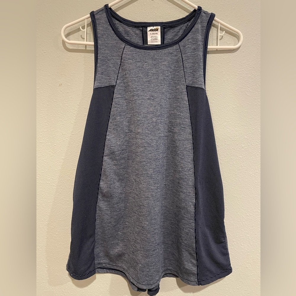 Women’s Avia Navy Mixed pattern Razorback tank.  L 12-14